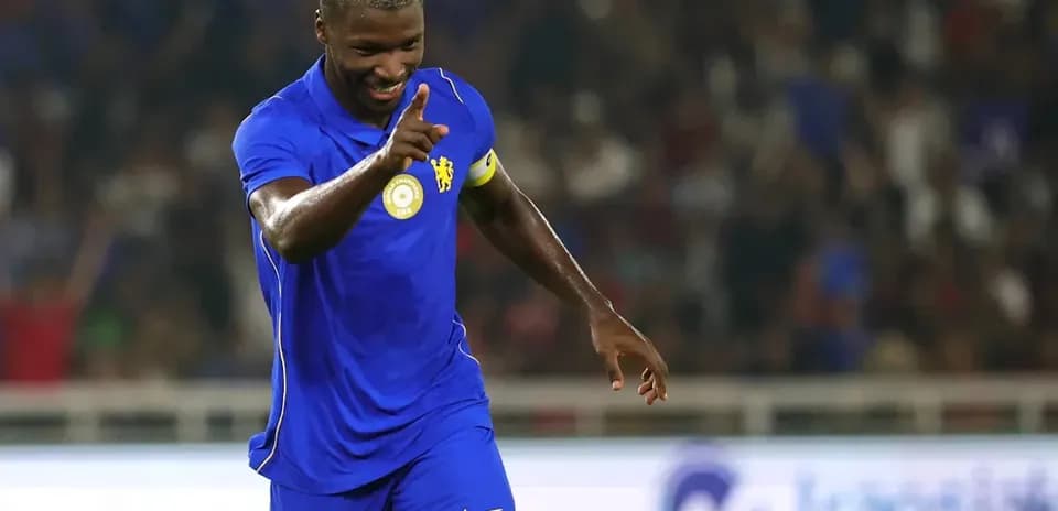 Player celebrating goal during match in blue kit