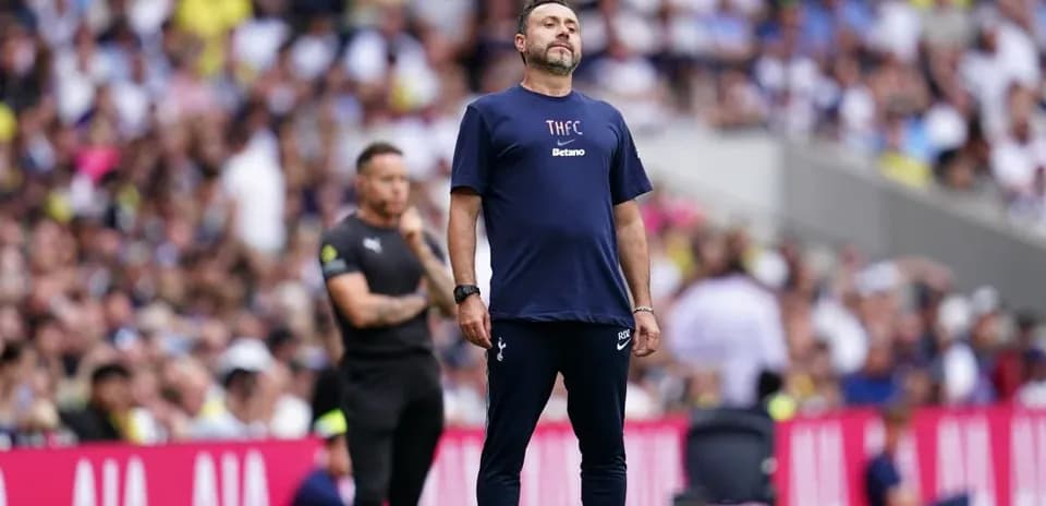Manager observing the match from the sideline