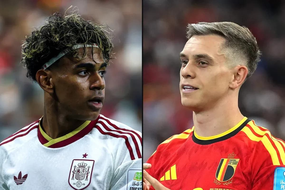 Two football players from Spain and Belgium in jerseys