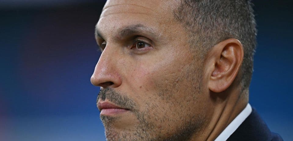 Profile view of a man with short hair