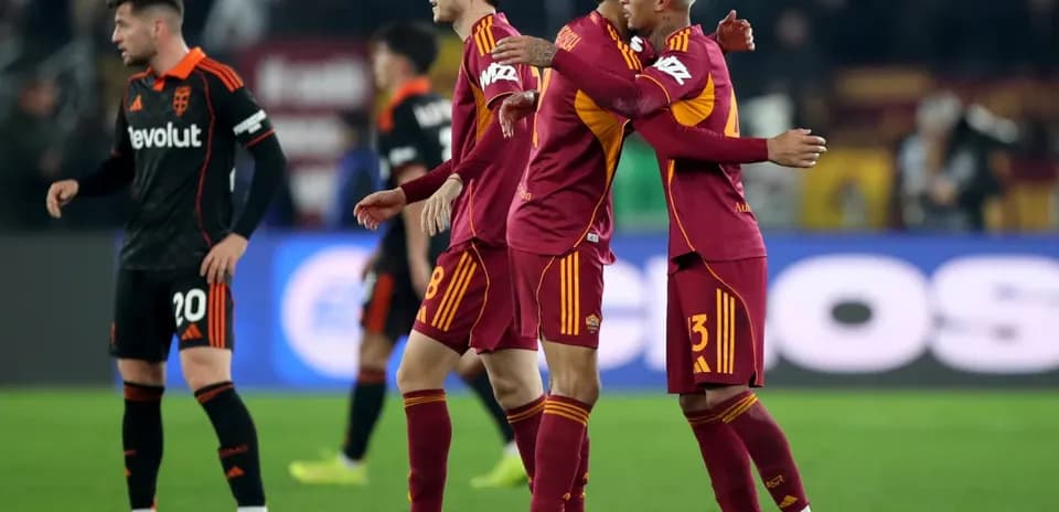 AS Roma players celebrating during Serie A match
