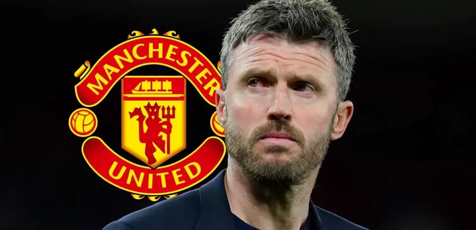 Coach with Manchester United logo in background
