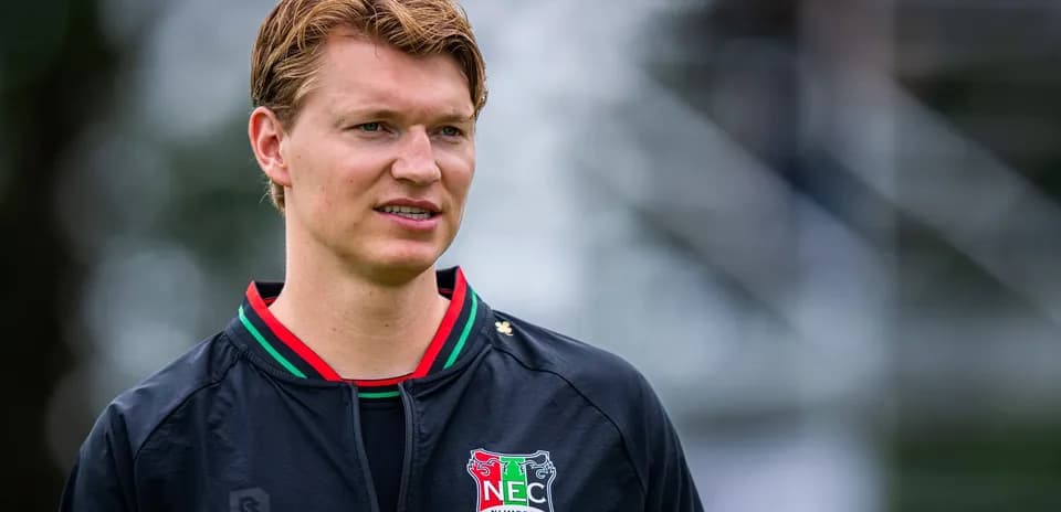 Player wearing NEC Nijmegen jacket during training