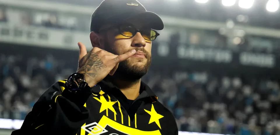 Man making a gesture in a sports venue