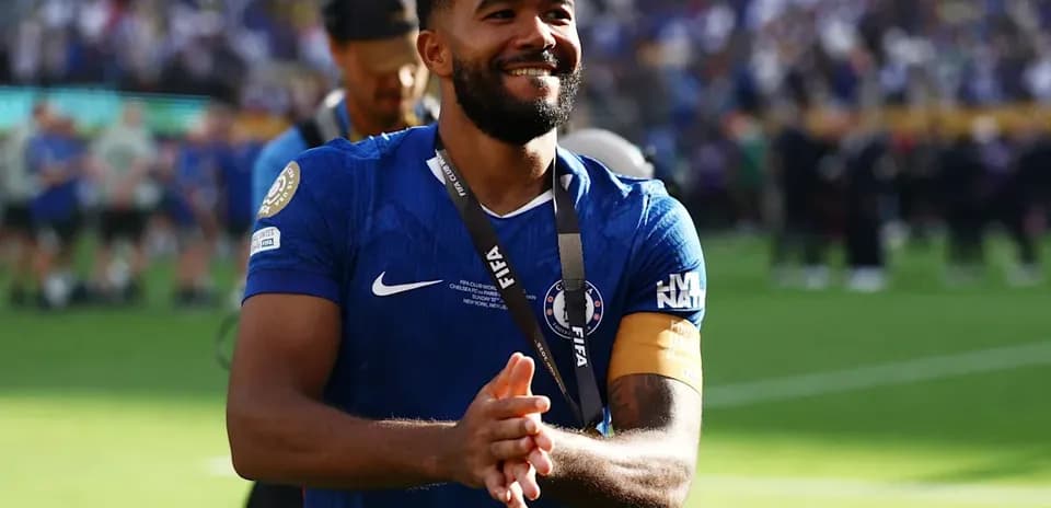 Player celebrating with medal after match victory