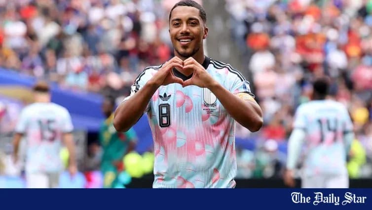 Player making a heart gesture after scoring goal