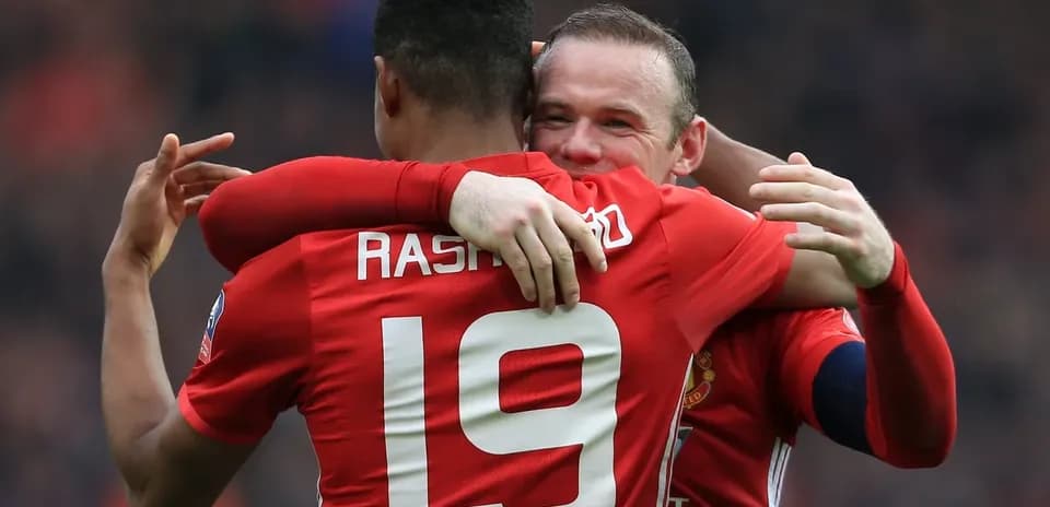 Two Manchester United players celebrating a goal