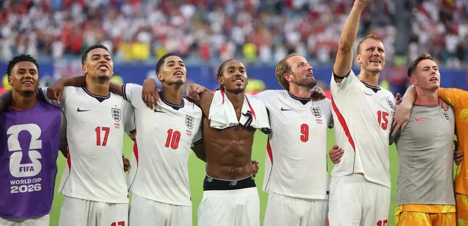 England players celebrating after a match victory