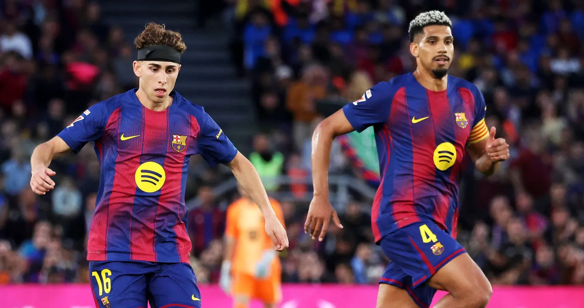 Barcelona players running during a match