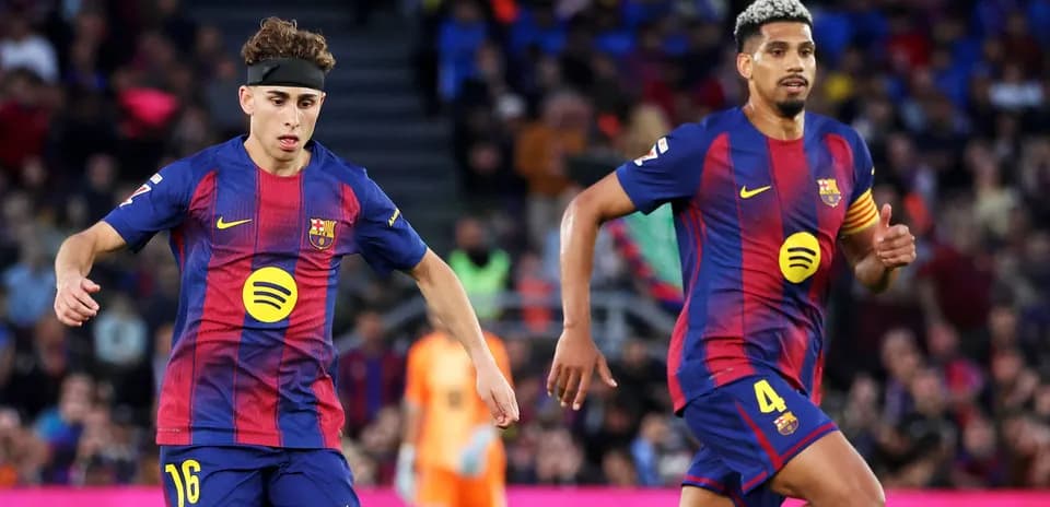 Barcelona players running during a match