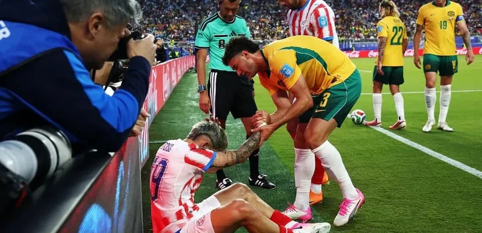 Player receiving assistance after falling during match