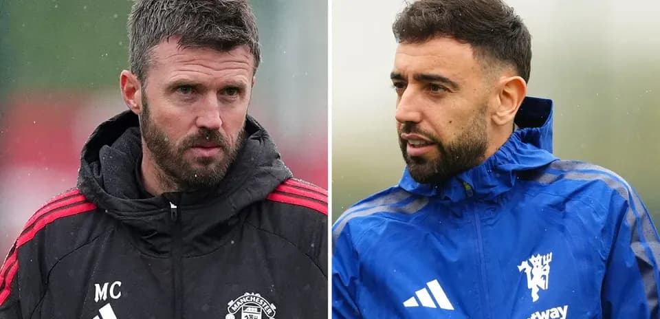 Two football coaches during training session