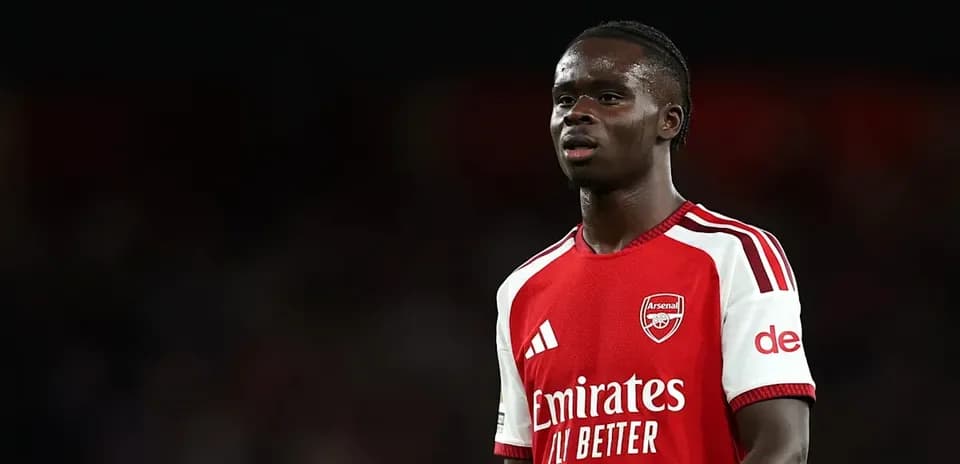 Player wearing Arsenal jersey during match