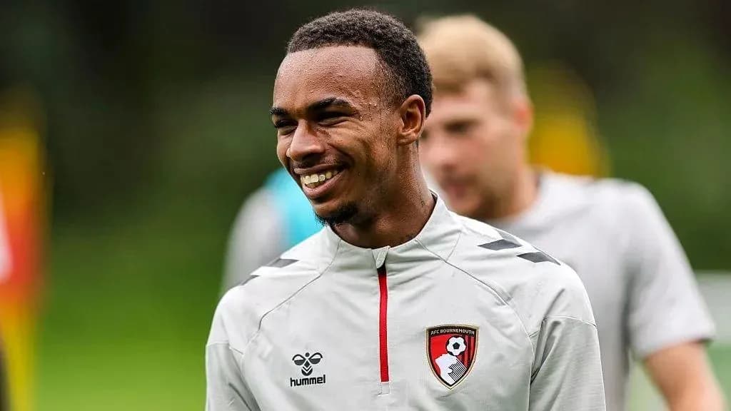 AFC Bournemouth player smiling during training session