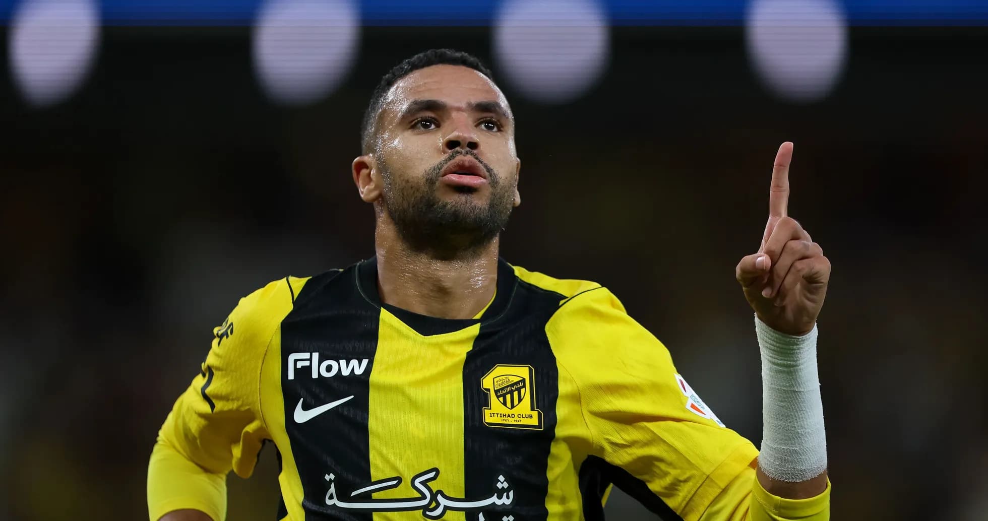 Player celebrating a goal for Ittihad Club