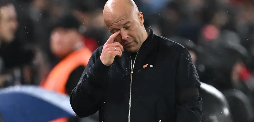 Coach wiping his eye during a match