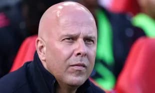 Coach observing the match from the sidelines