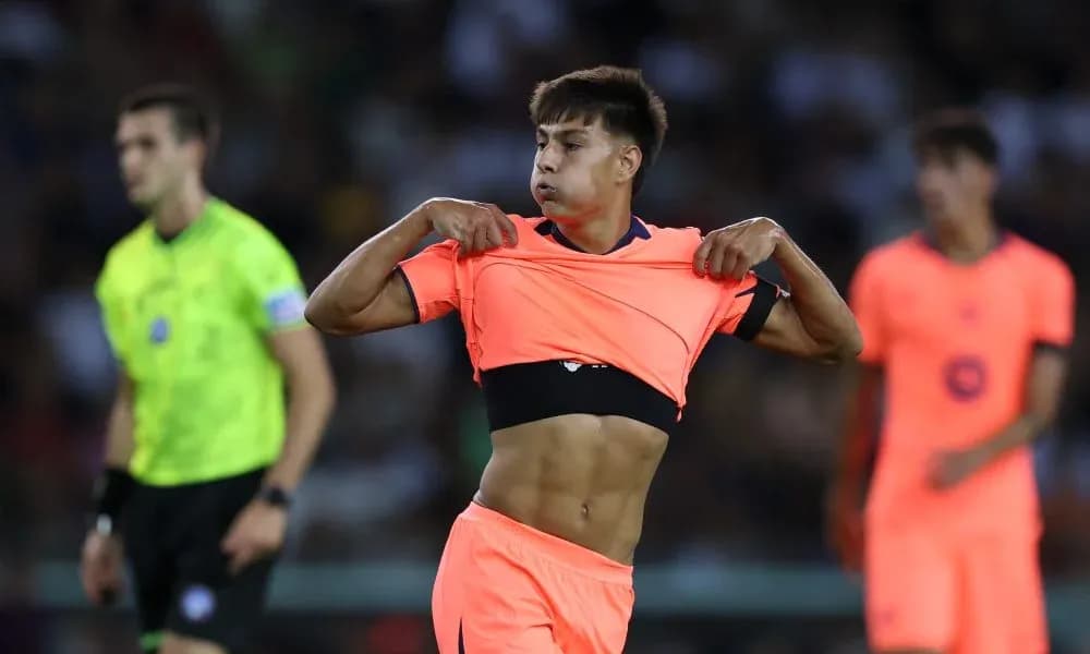 Player removing shirt during match on field
