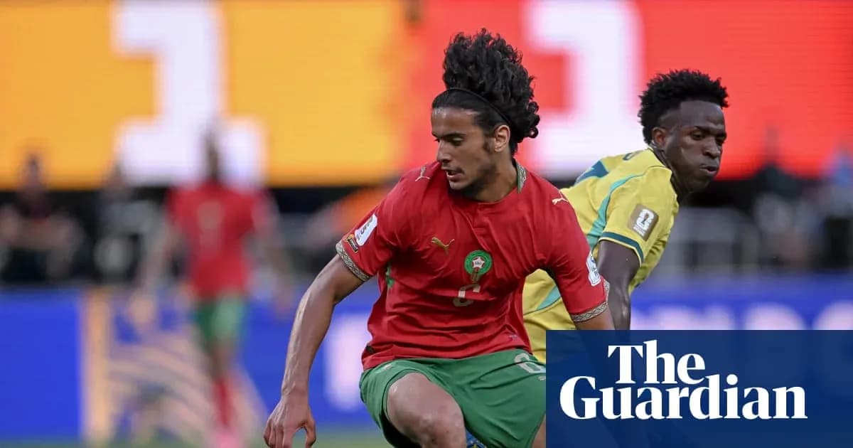 Moroccan player evading opponent during football match
