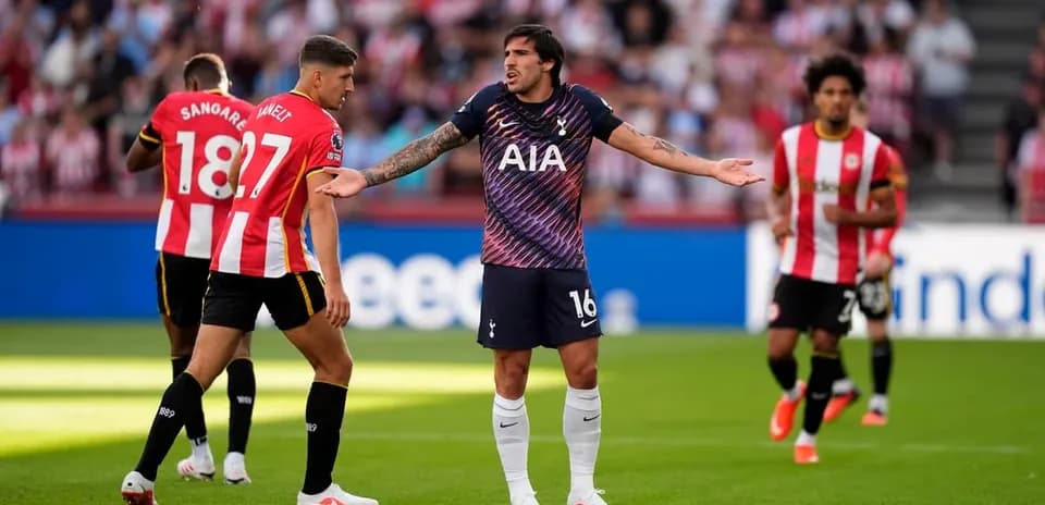 Player gesturing during a match with teammates nearby