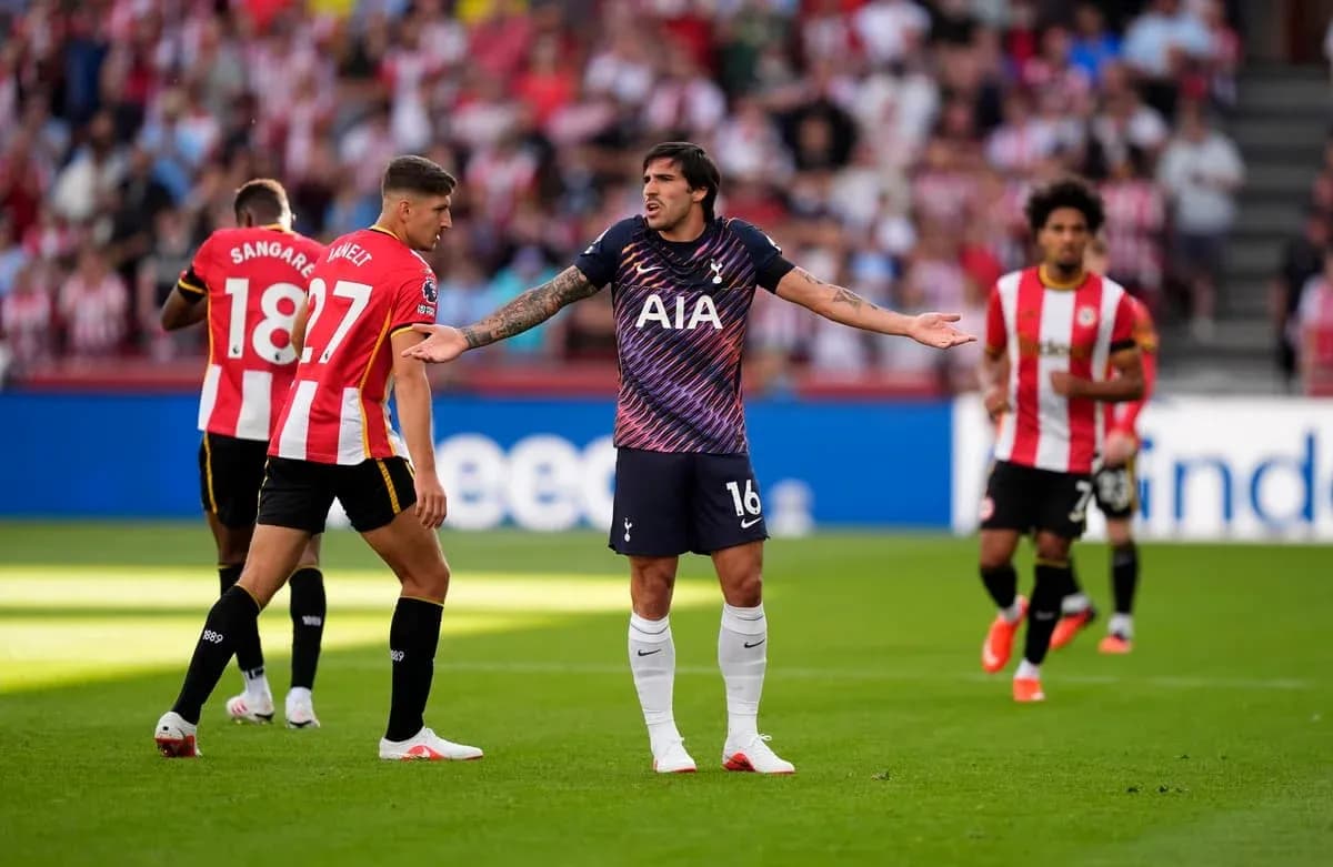 Player gesturing during a match with teammates nearby