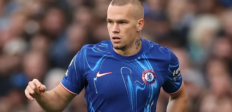 Player in Chelsea jersey during match action