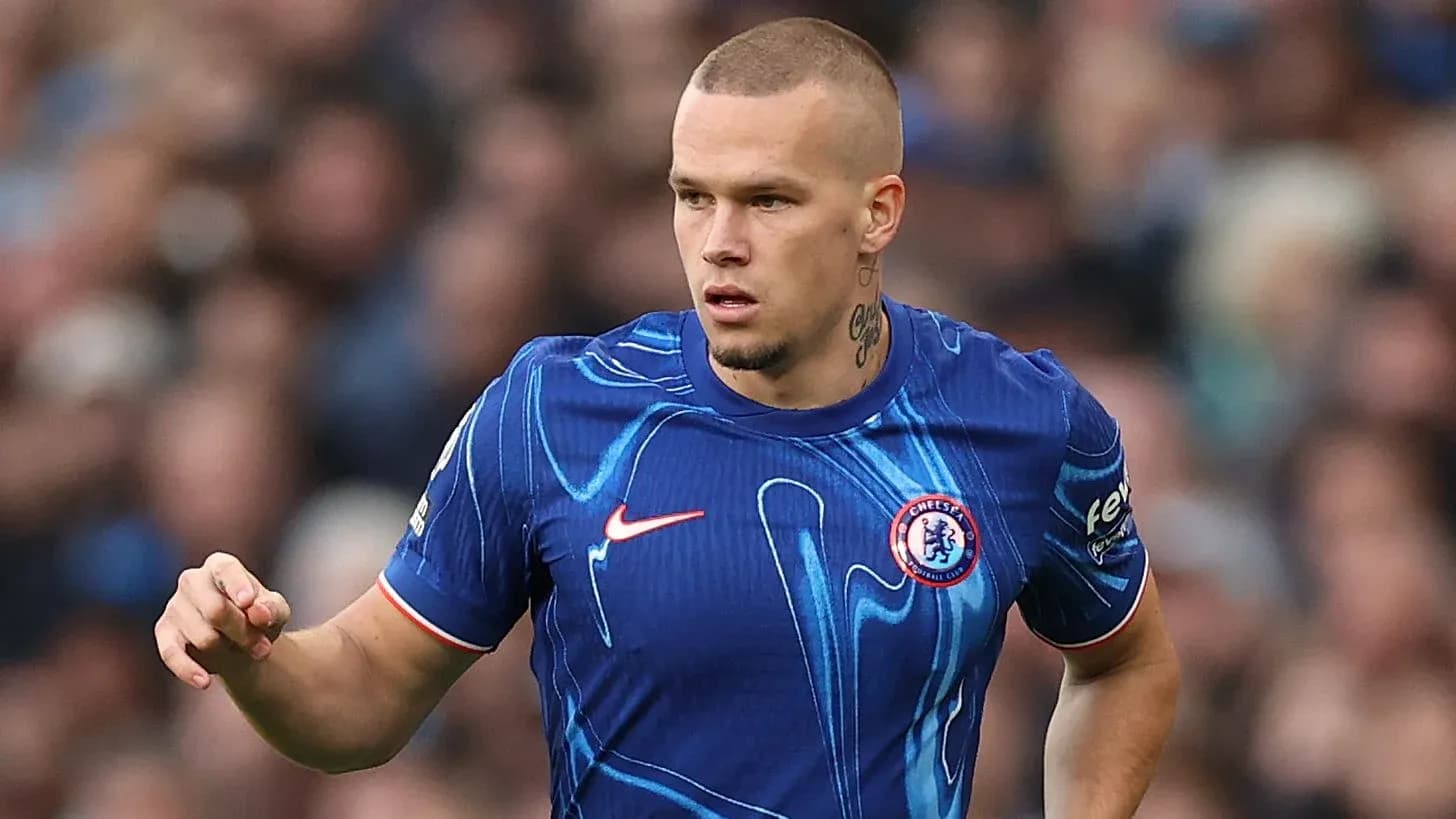 Player in Chelsea jersey during match action