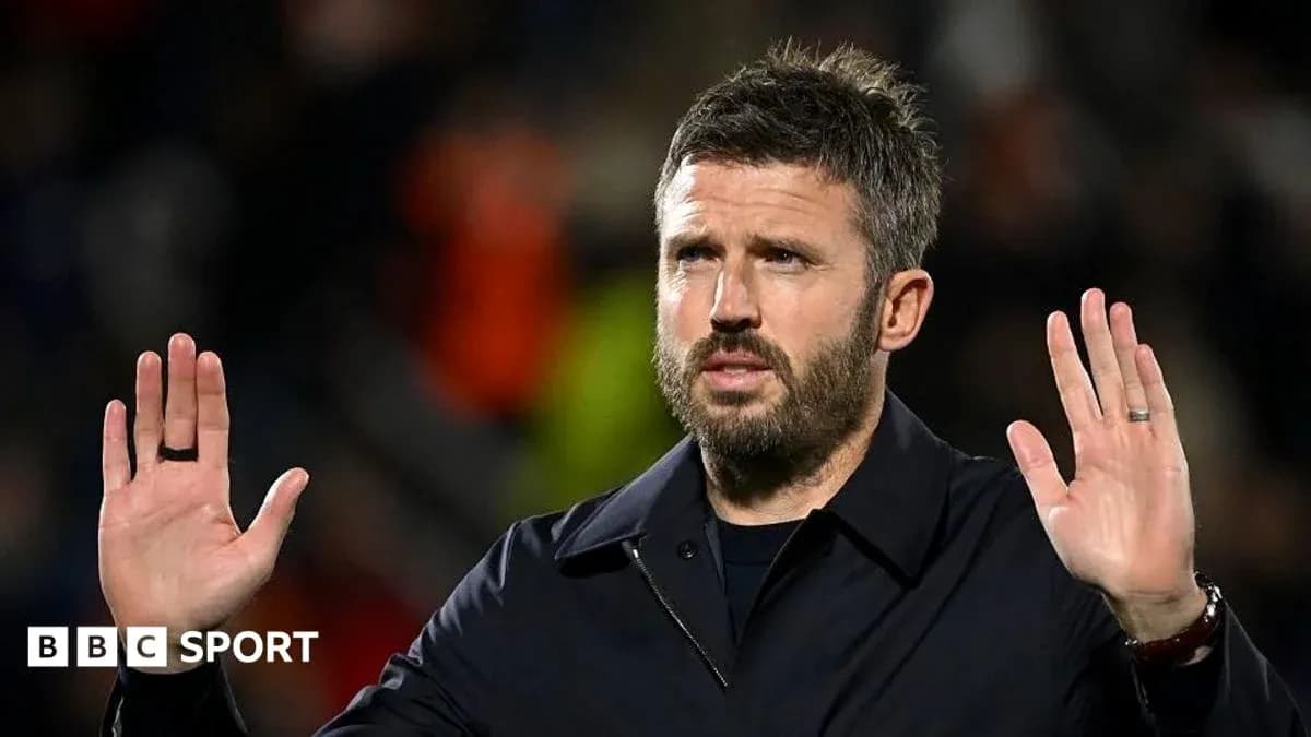 Manager gesturing during a football match
