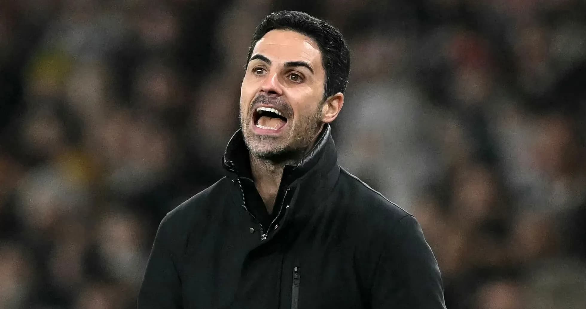 Manager giving instructions on the sidelines during match