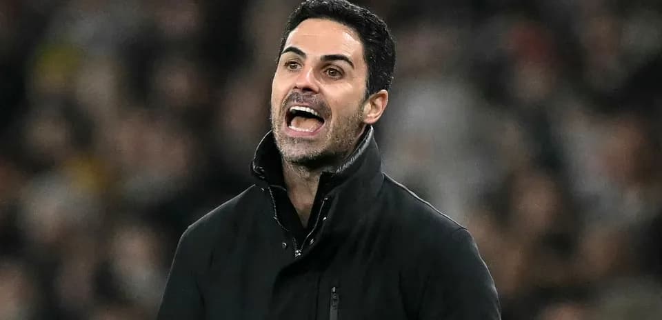 Manager giving instructions on the sidelines during match