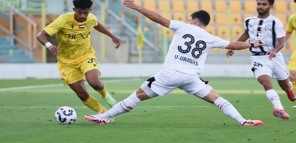 Al Wasl U23 player dribbling past Al Jazira U23 opponent