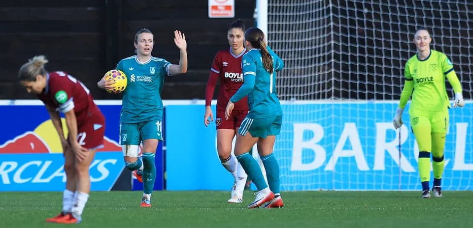 Liverpool W players celebrating during FA WSL match