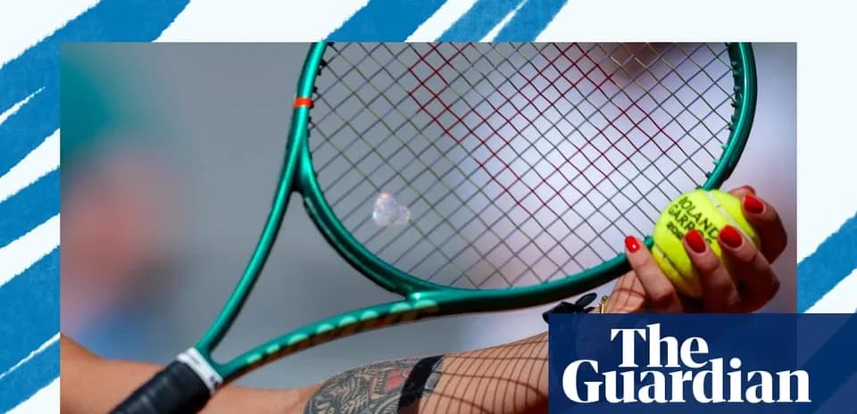 Tennis racket and ball held in player’s hand