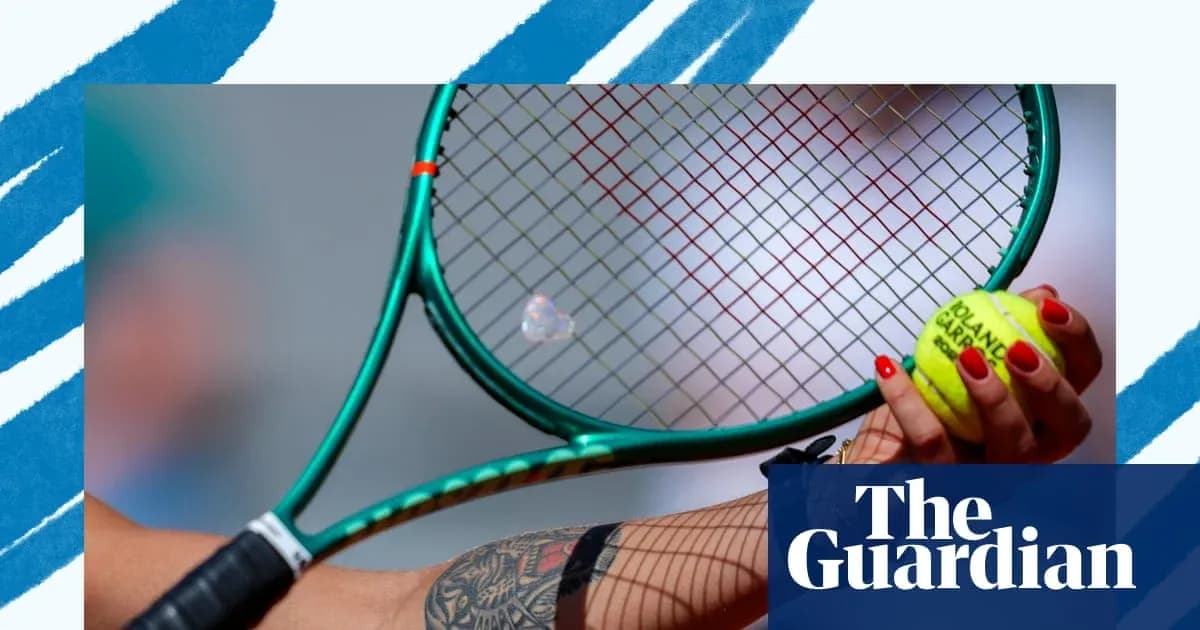Tennis racket and ball held in player’s hand