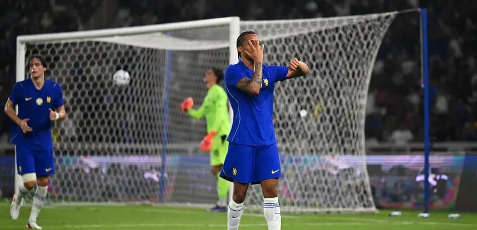Player in blue jersey reacting during match action