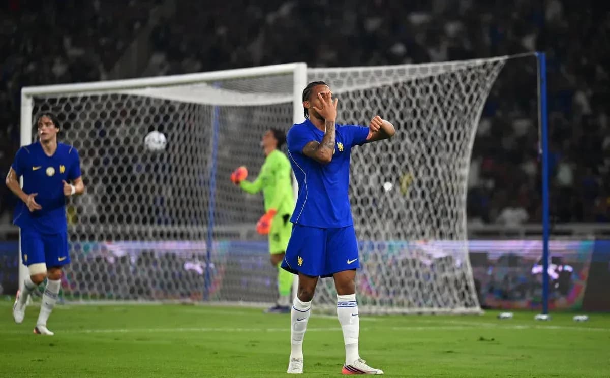 Player in blue jersey reacting during match action