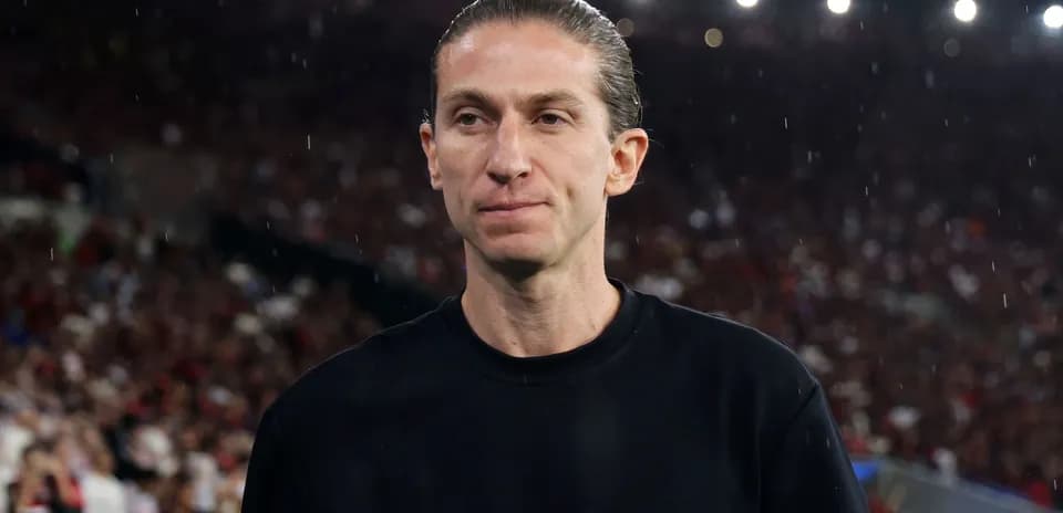 Coach on the sidelines during a match
