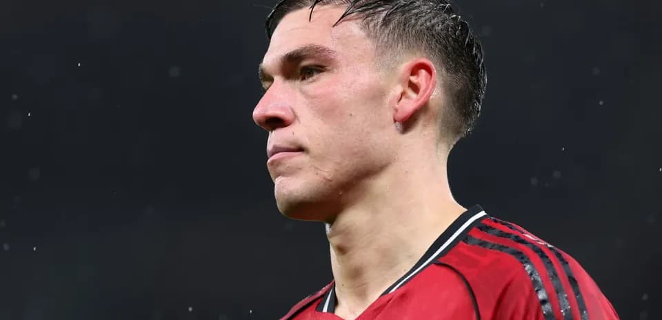 Player in red jersey during a match
