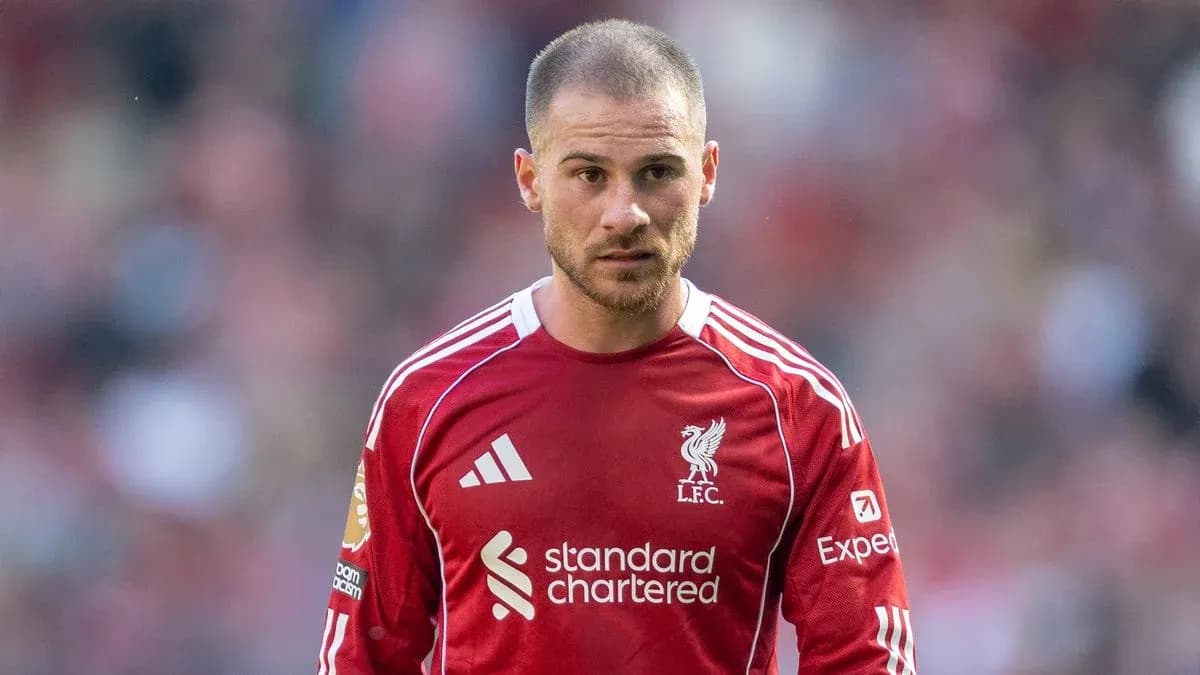 Player wearing Liverpool jersey on the field
