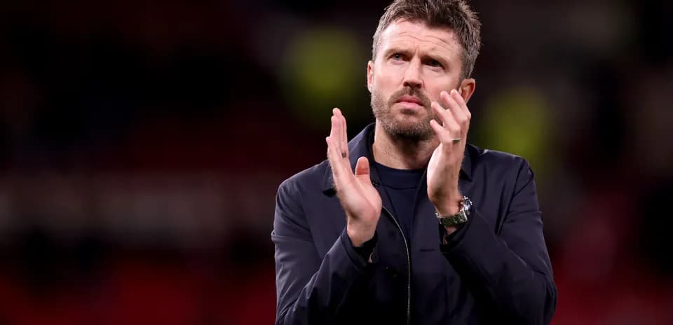 Coach applauding fans after the match