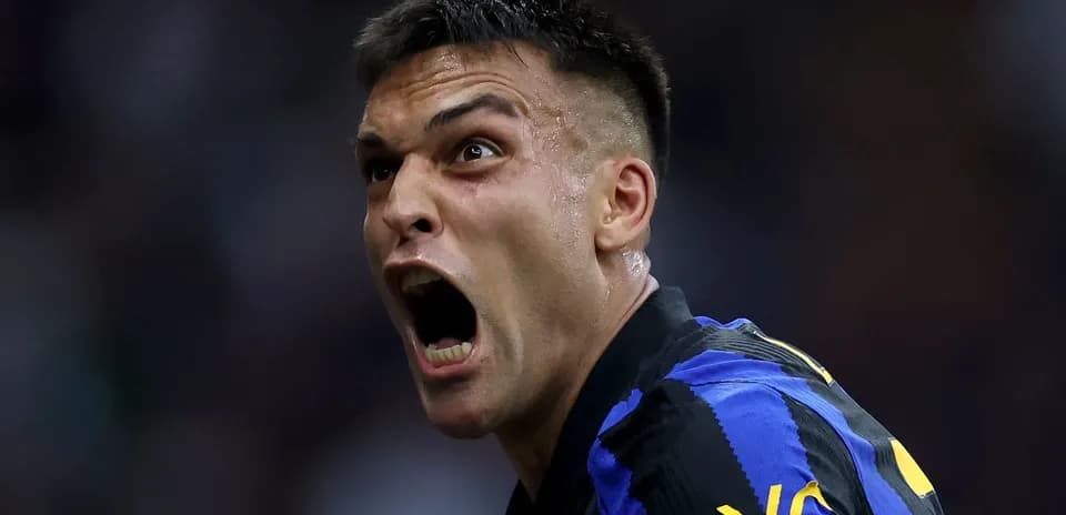 Player celebrating a goal with intense expression