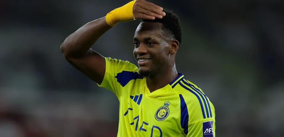 Player celebrating in bright yellow team jersey