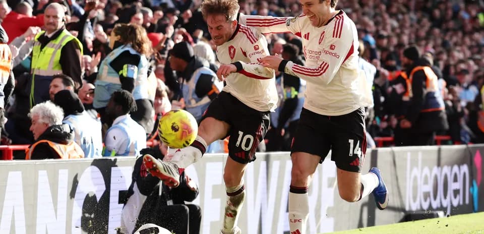 Liverpool players celebrating a goal during match