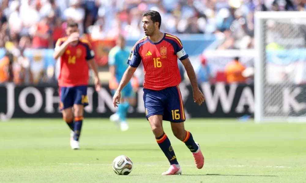 Spain player dribbling the ball during match