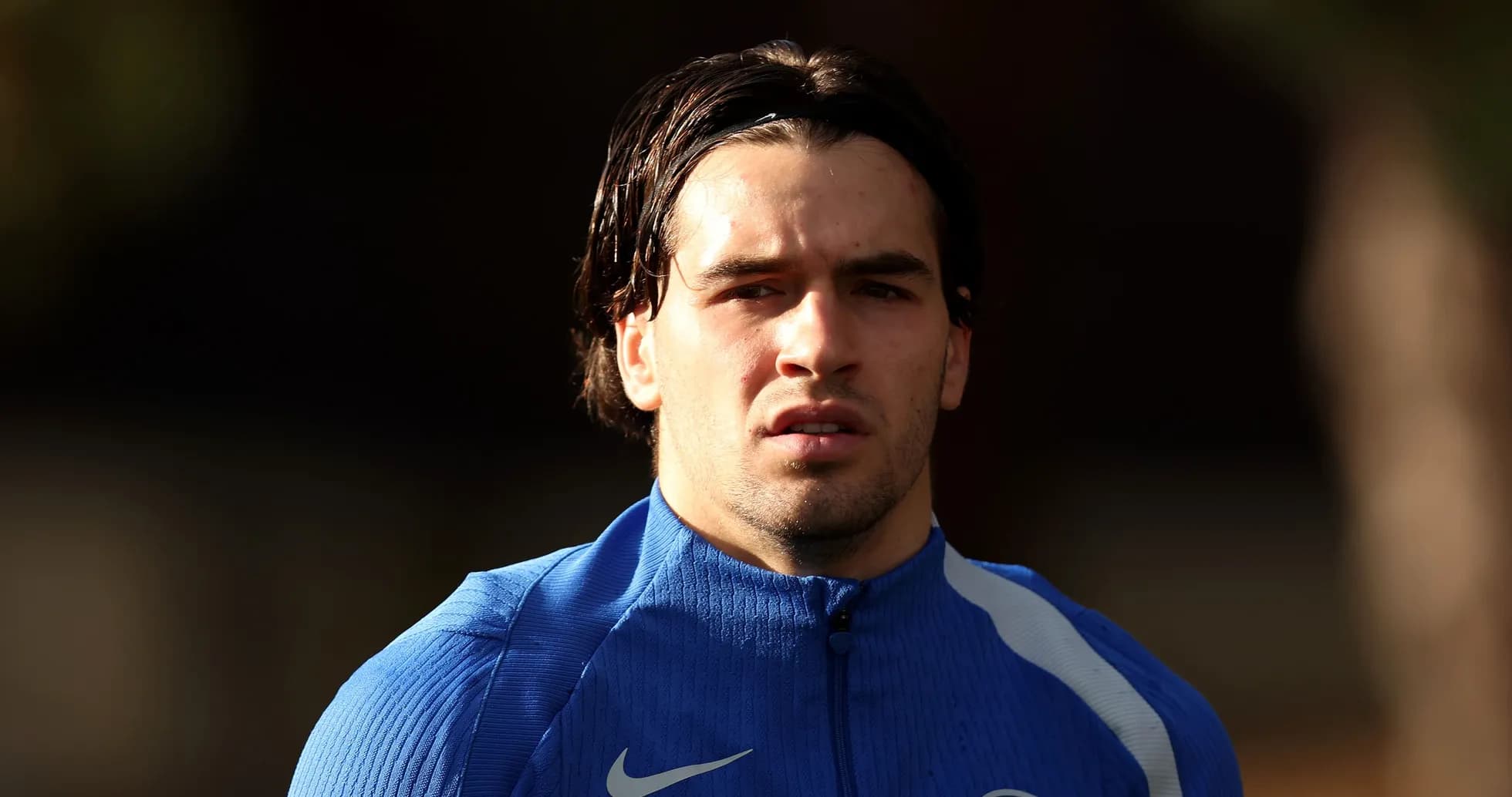 Player wearing blue training kit during session