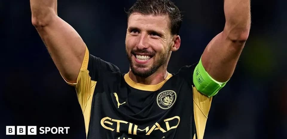 Player celebrating with arms raised in victory
