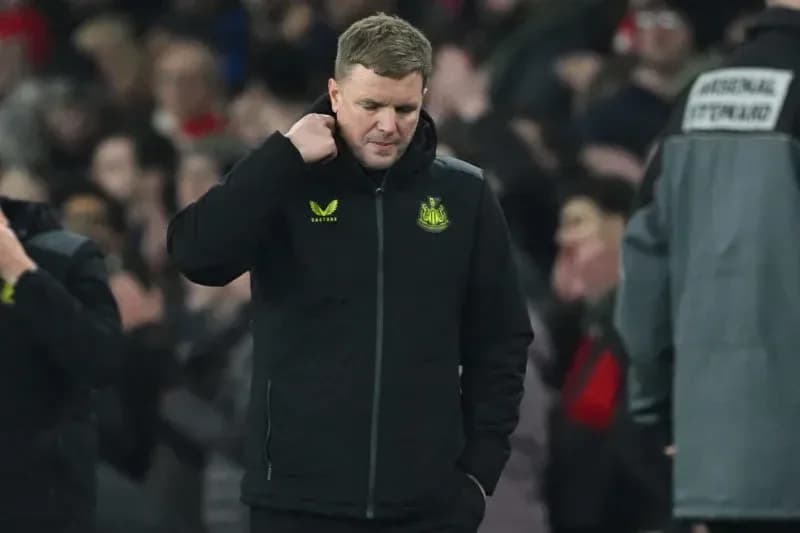 Newcastle manager walking off the pitch after match