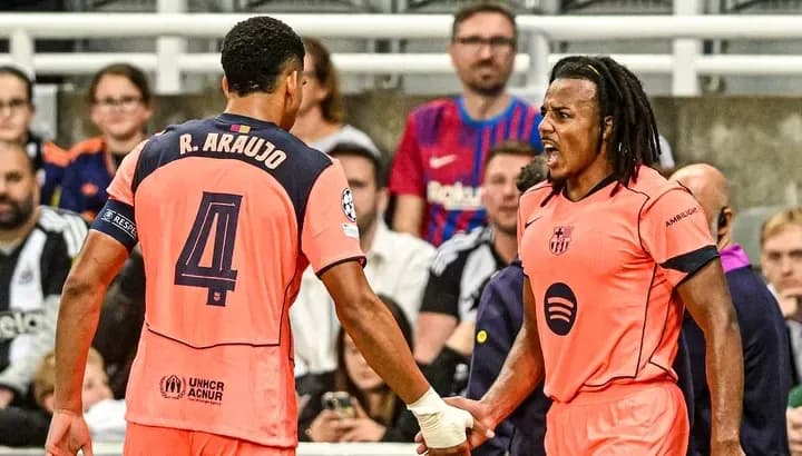 Two players discussing during a football match