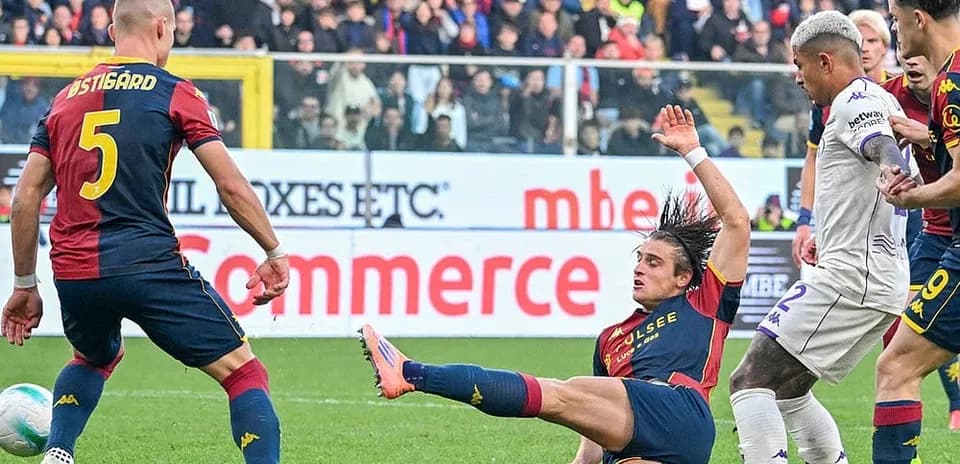 Genoa player falling during Serie A match