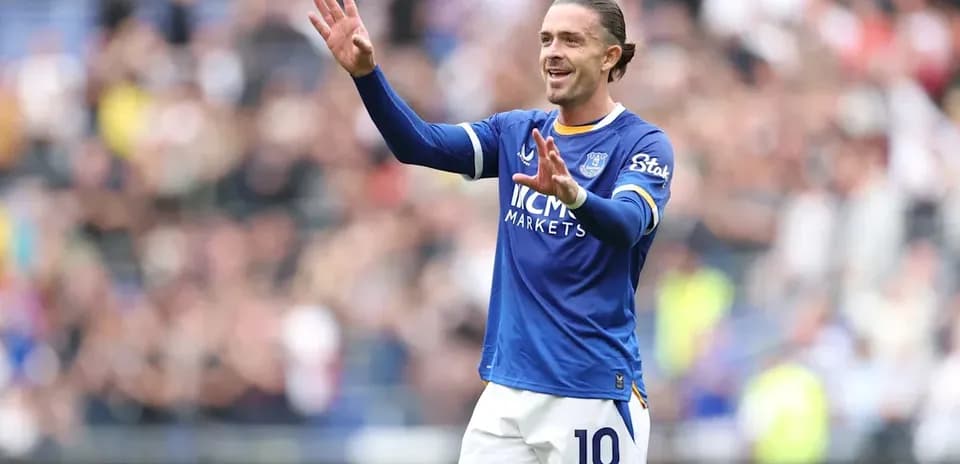 Player gesturing during match in blue jersey